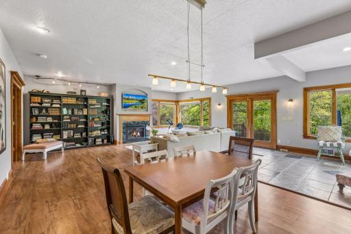 A natural transition into the living room, complete with a second gas fireplace.