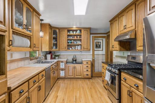 Abundant cabinet space, generous countertops, and a window that brings in natural light.
