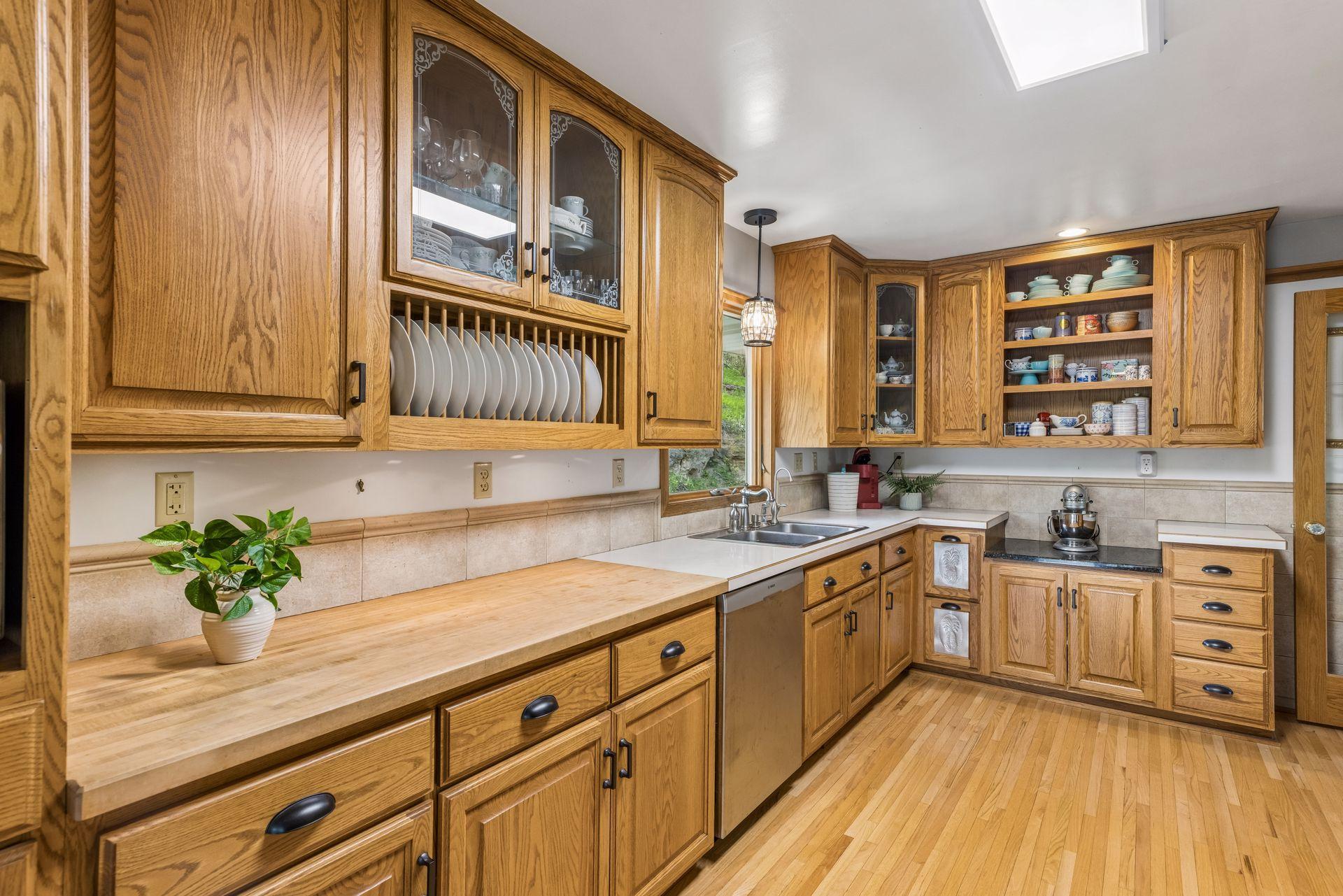 Custom cabinetry and butcher block counters add warmth and character to the space.
