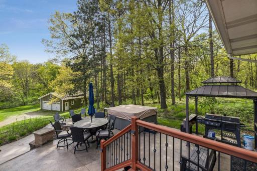 The ultimate entertaining space with room to gather, grill, and relaxâplus a Cal Spa hot tub included.