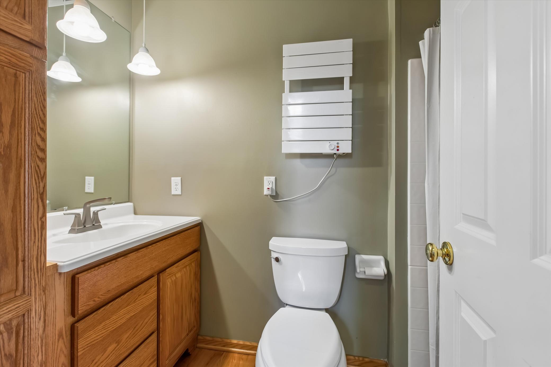 Main level 3/4 bath with towel warmer
