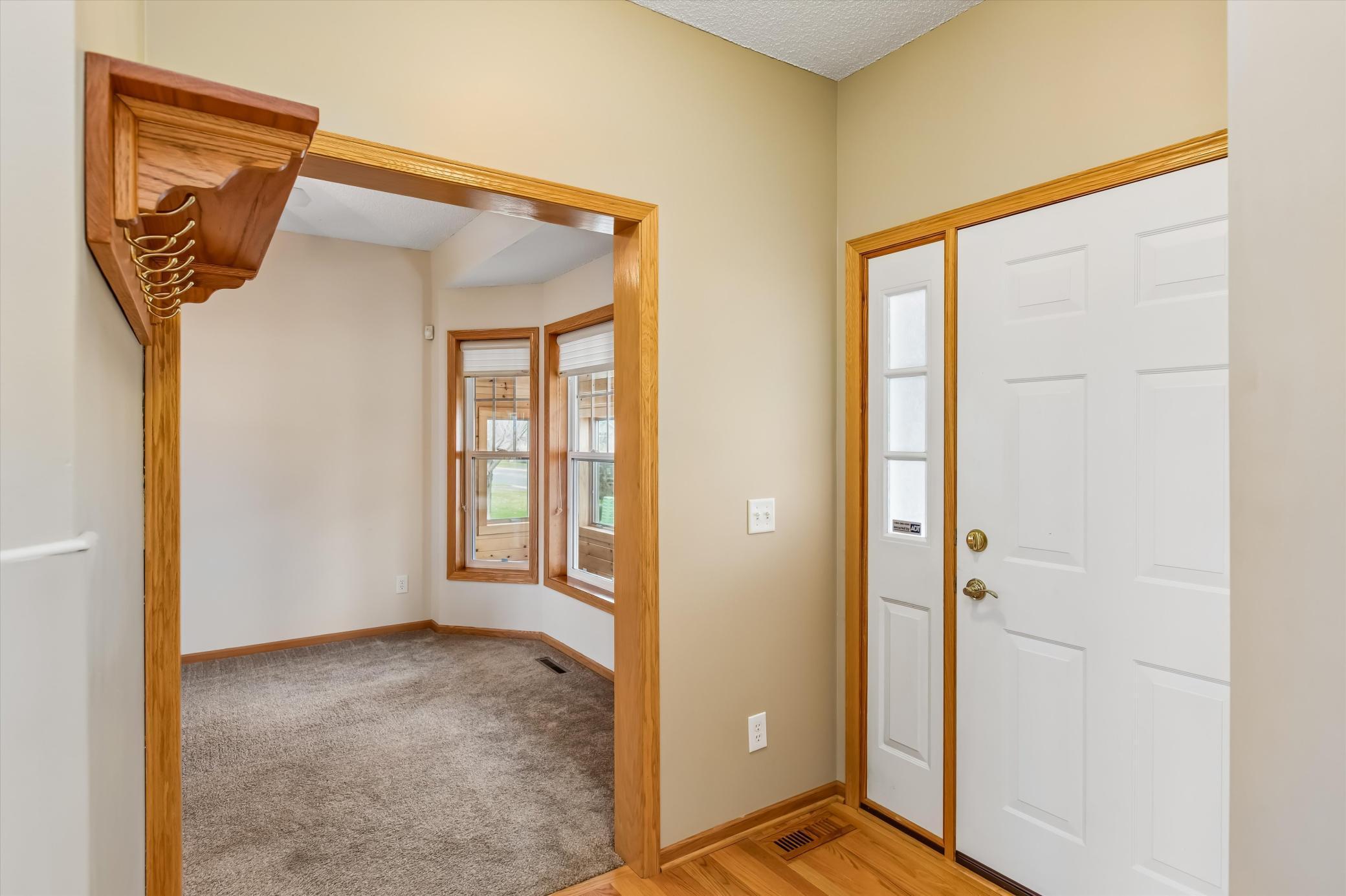 Foyer showing neutral paint throughout