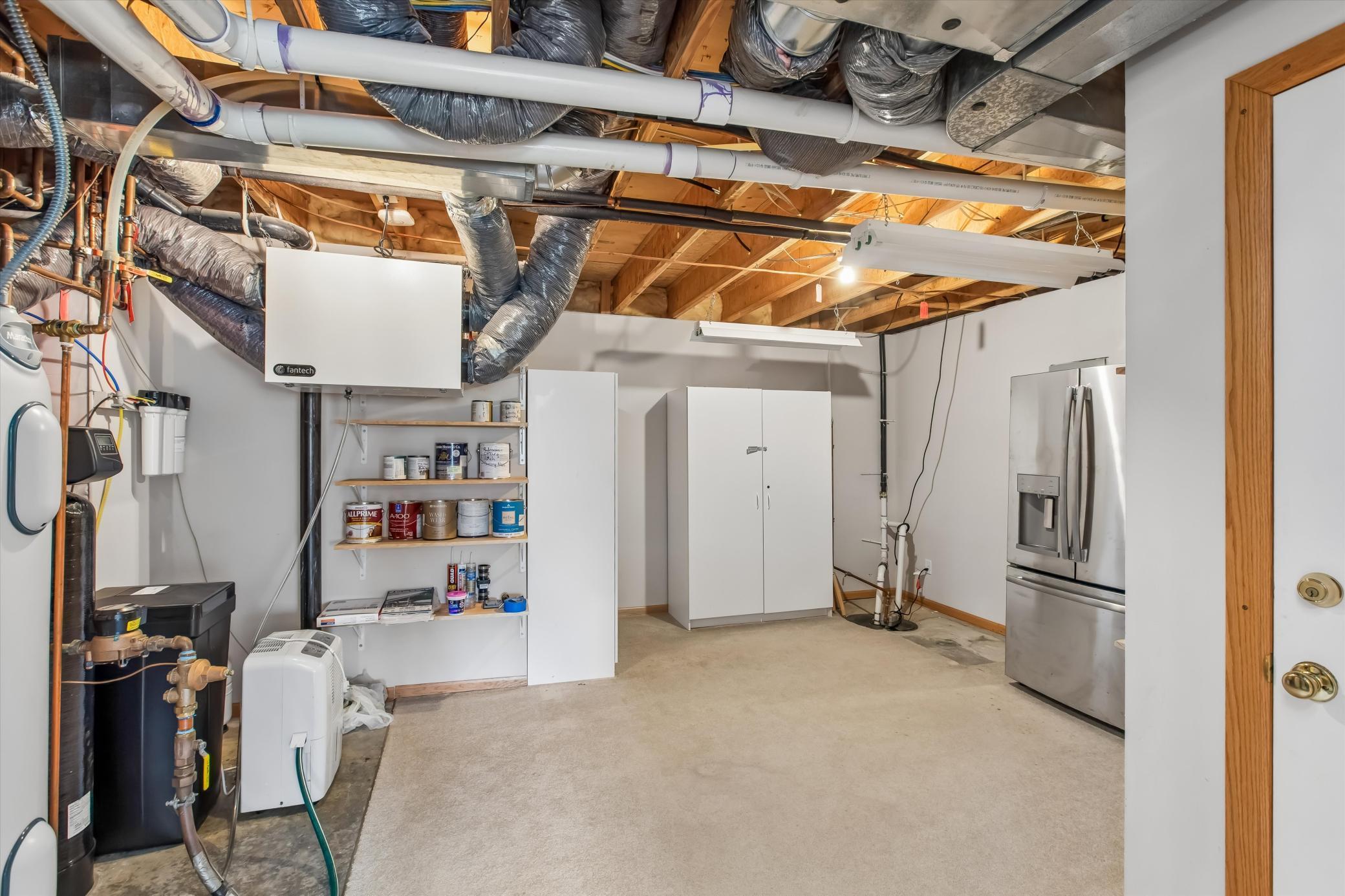 Utility room with extra fridge and storage