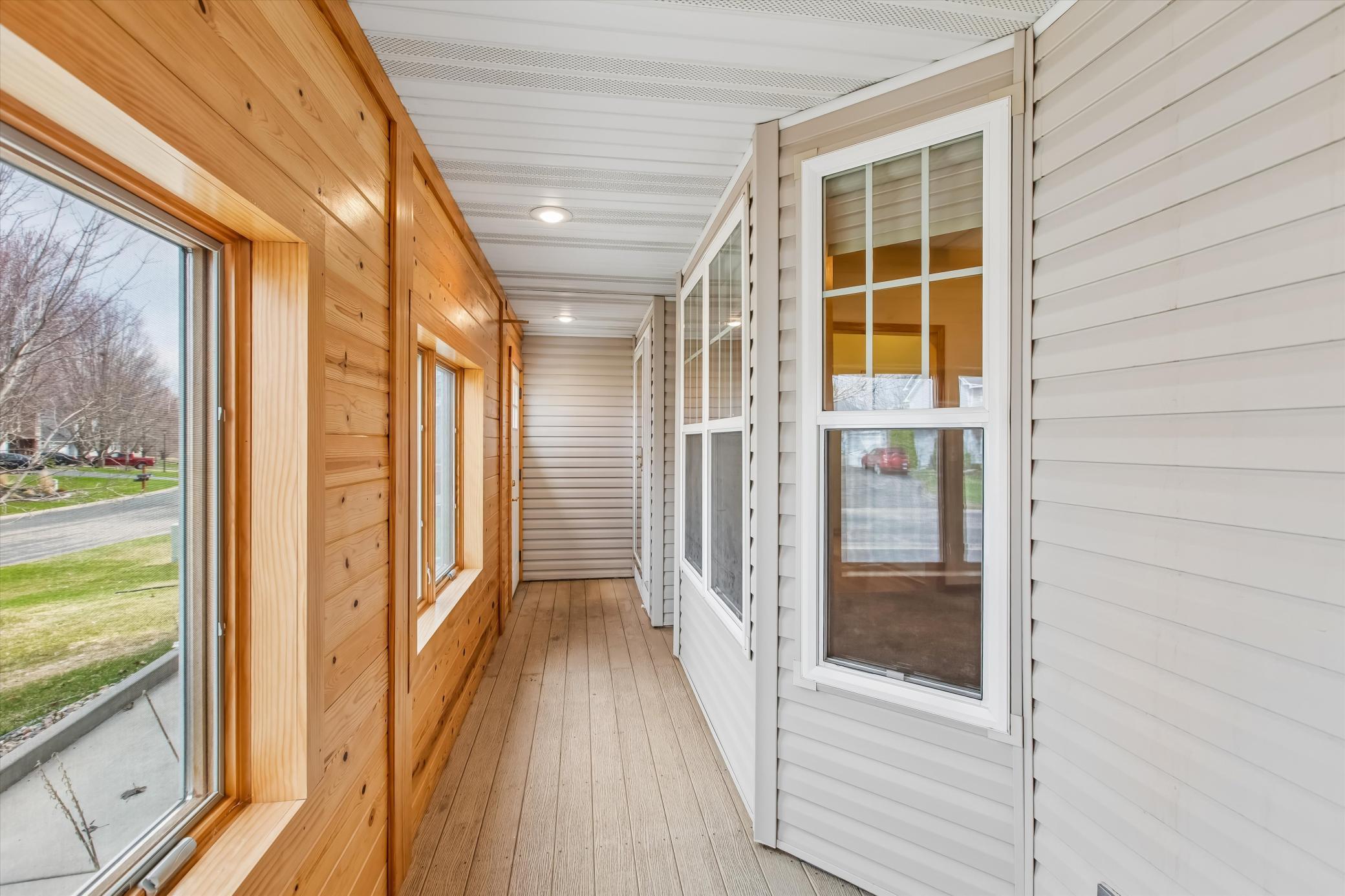 Room for a few chairs in enclosed porch