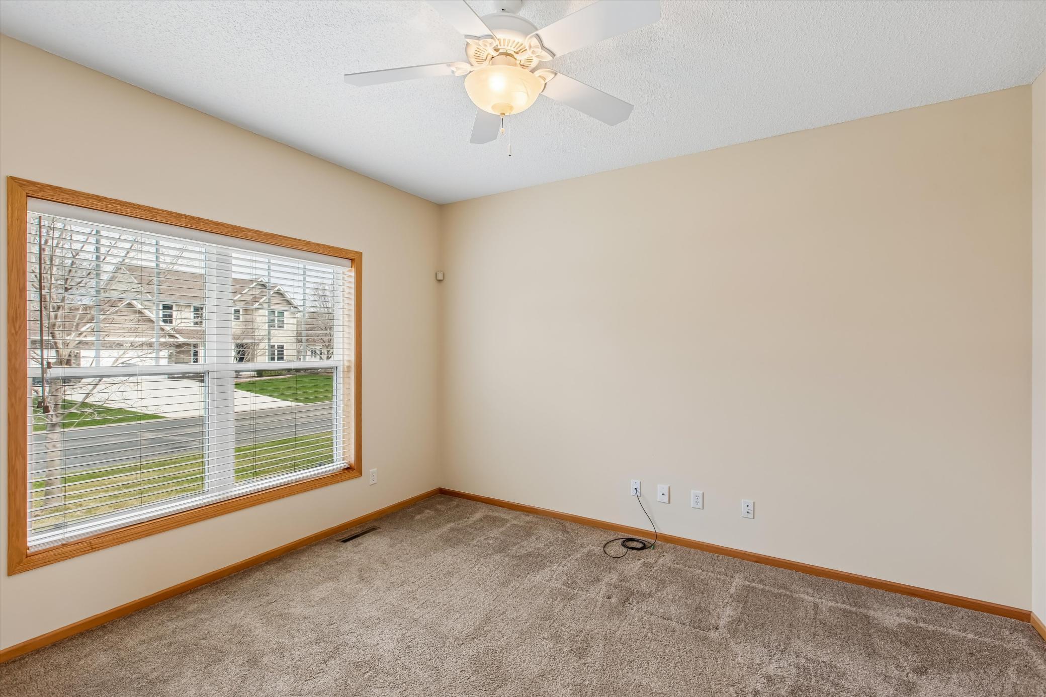 Big window facing front of house in office