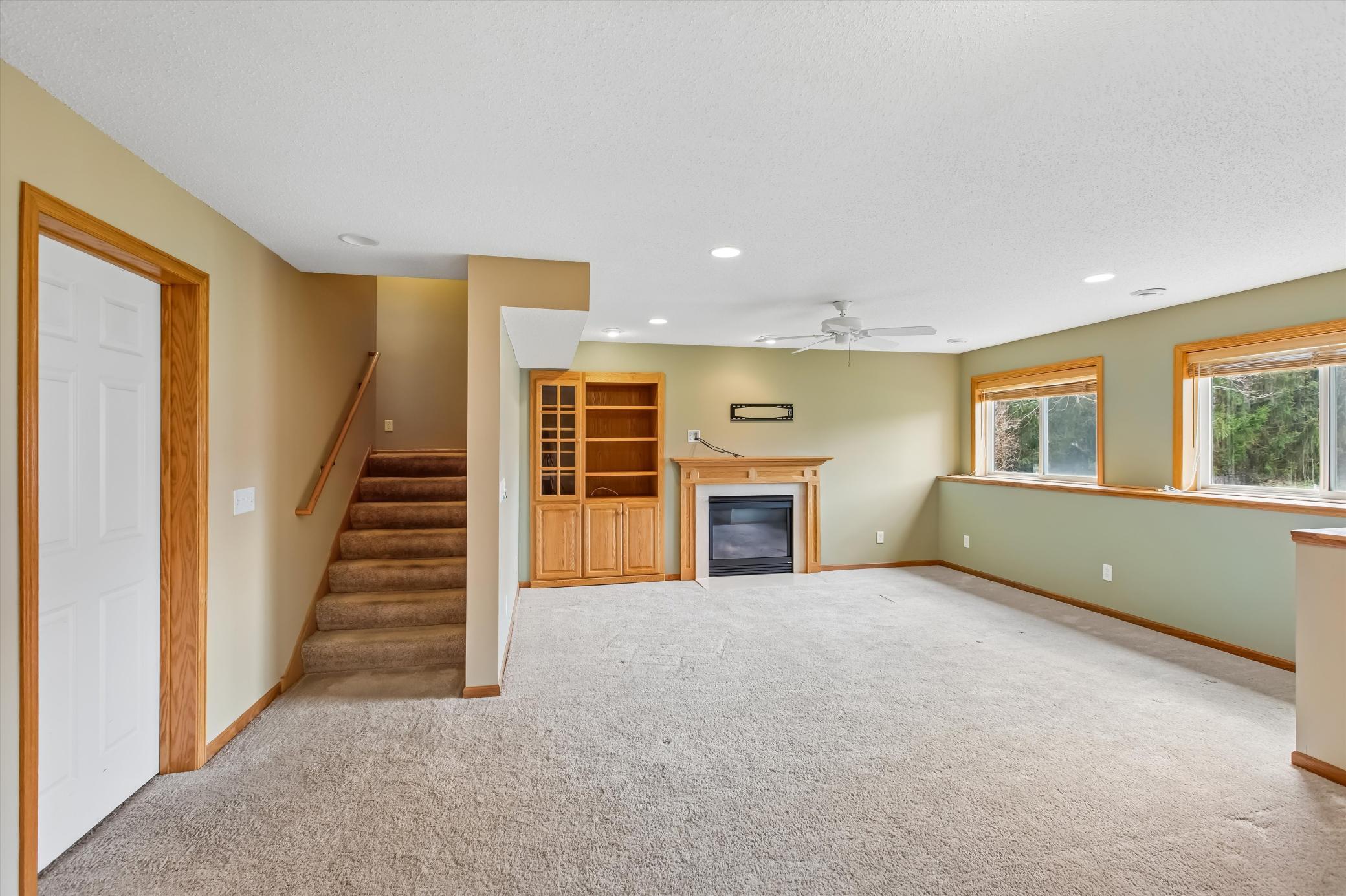 Built-ins and fireplace make this room