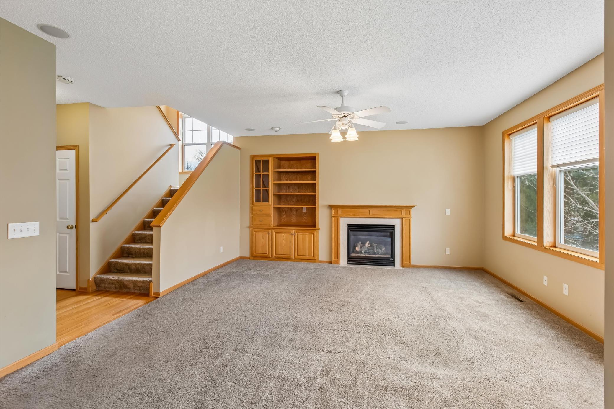 Large family room with built-ins and fireplace