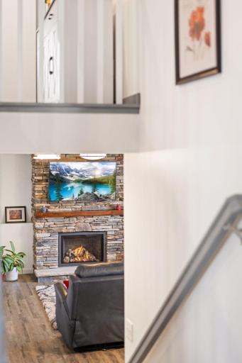 Expanded living area in the lower level with a family room, additional bedroom and 1/2 bath.
