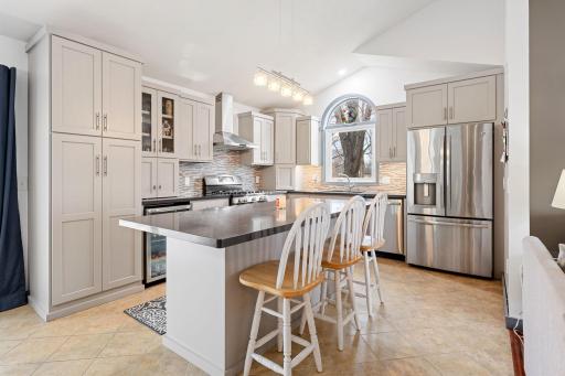 Ample storage space, stainless steel appliances and a kitchen center island make this kitchen functional for everyday living and ideal for hosting.