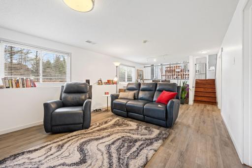 New luxury vinyl plank flooring throughout the lower level will stand up to wear and tear.