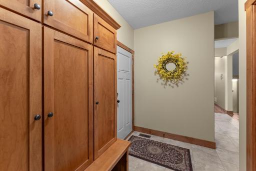 The mud room offers access to the huge three-car garage.