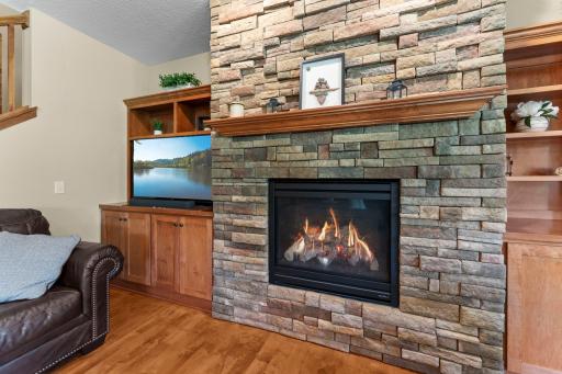 The fireplace is the perfect centerpiece for the living room.
