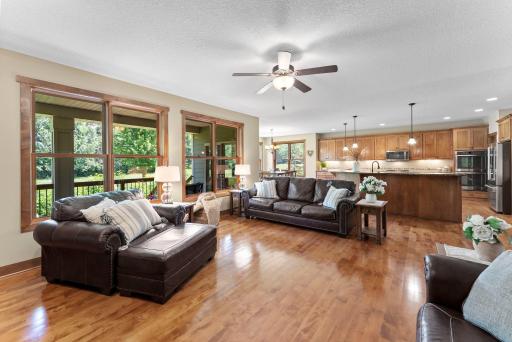 The living room and dining area offer views of the golf course.
