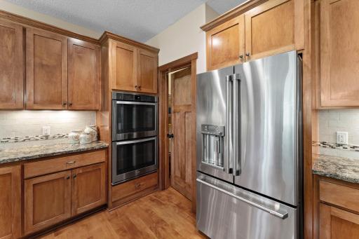 This kitchen features a cooktop and double oven.