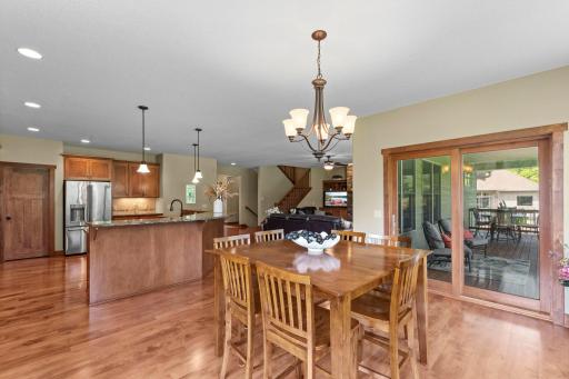The main level features an open floor plan and beautiful natural woodwork.
