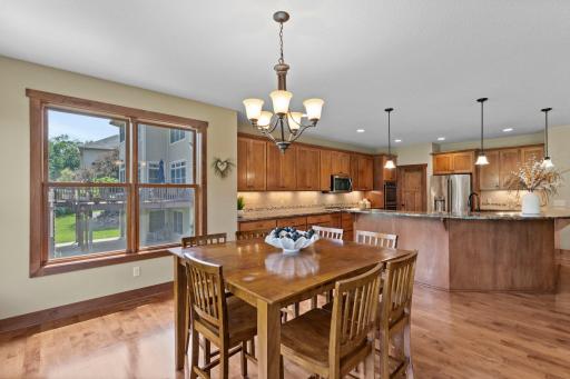 The main level features an open floor plan and beautiful natural woodwork.
