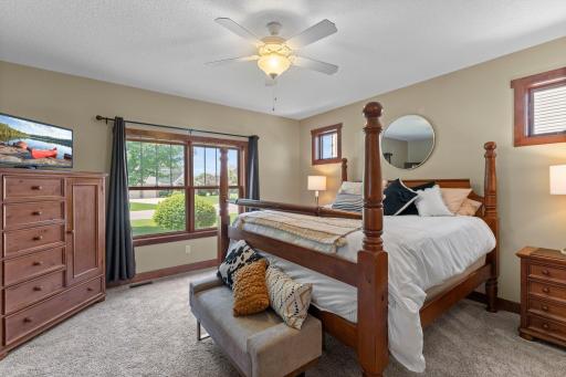 The expansive primary bedroom is located on the main level and includes a huge walk-in closet and private ensuite bathroom.