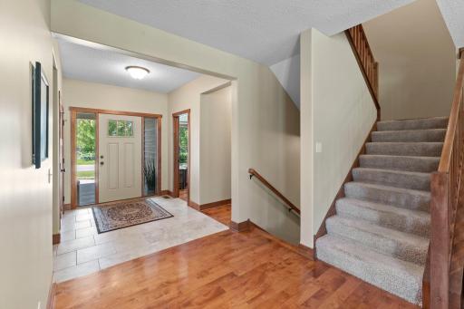 The foyer includes two sidelights to allow natural light into the entry.