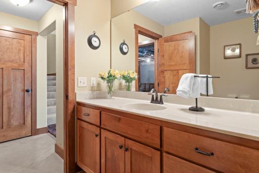 The lower level includes a full bathroom.