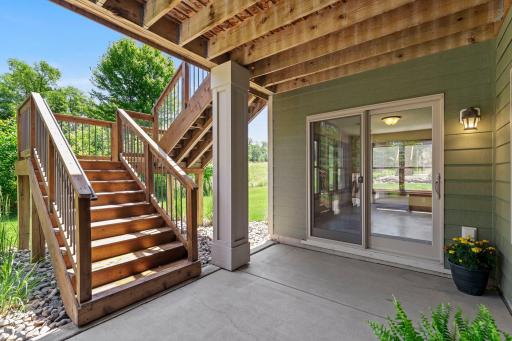 The patio offers access to the deck and vice-versa.