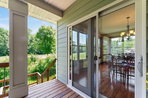 The deck offers access to the backyard and the concrete patio.