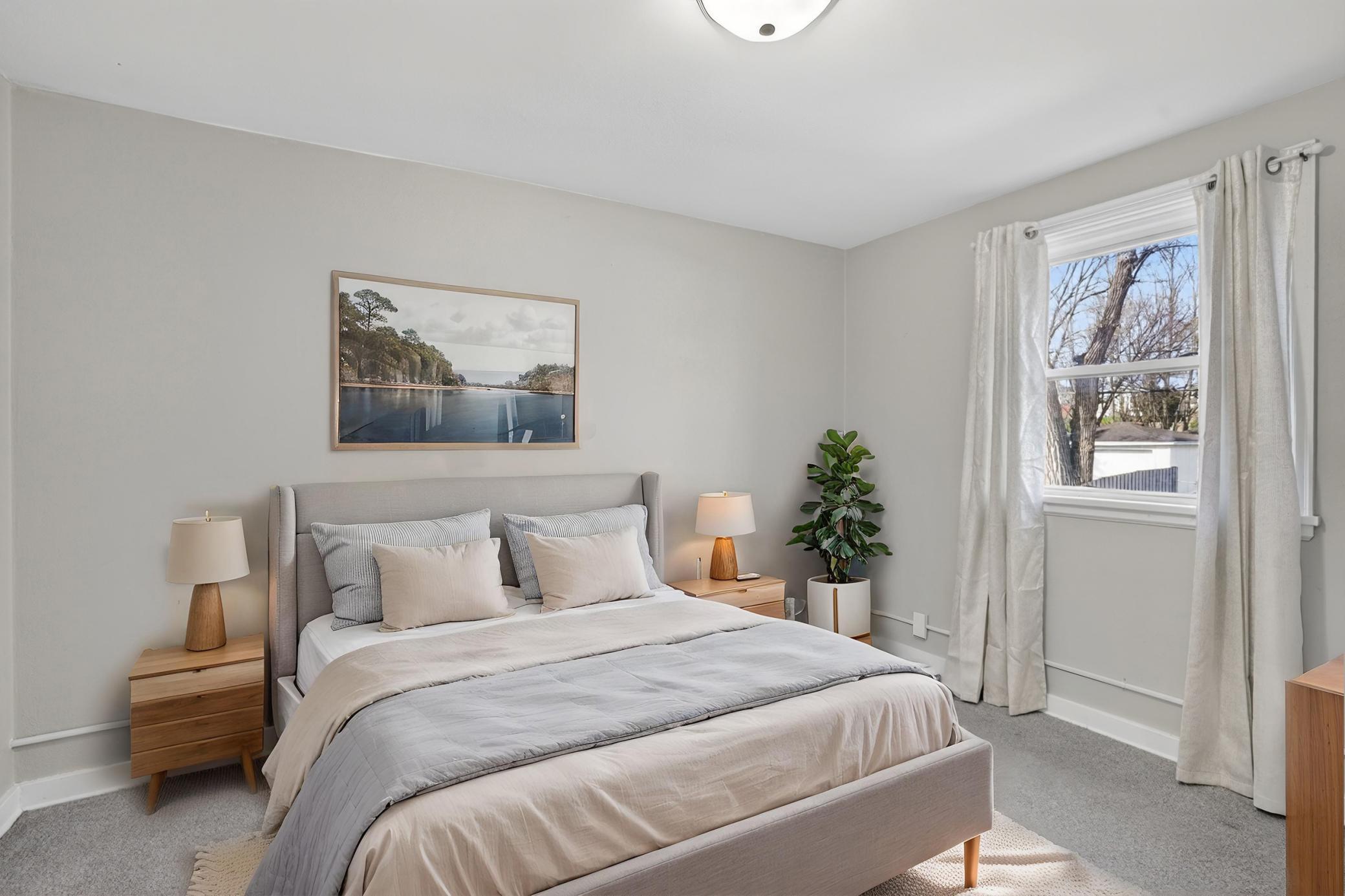 Beautiful virtually staged upper-level bedroom to help you envision its full potential.