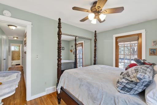 Exit to back deck from primary bedroom