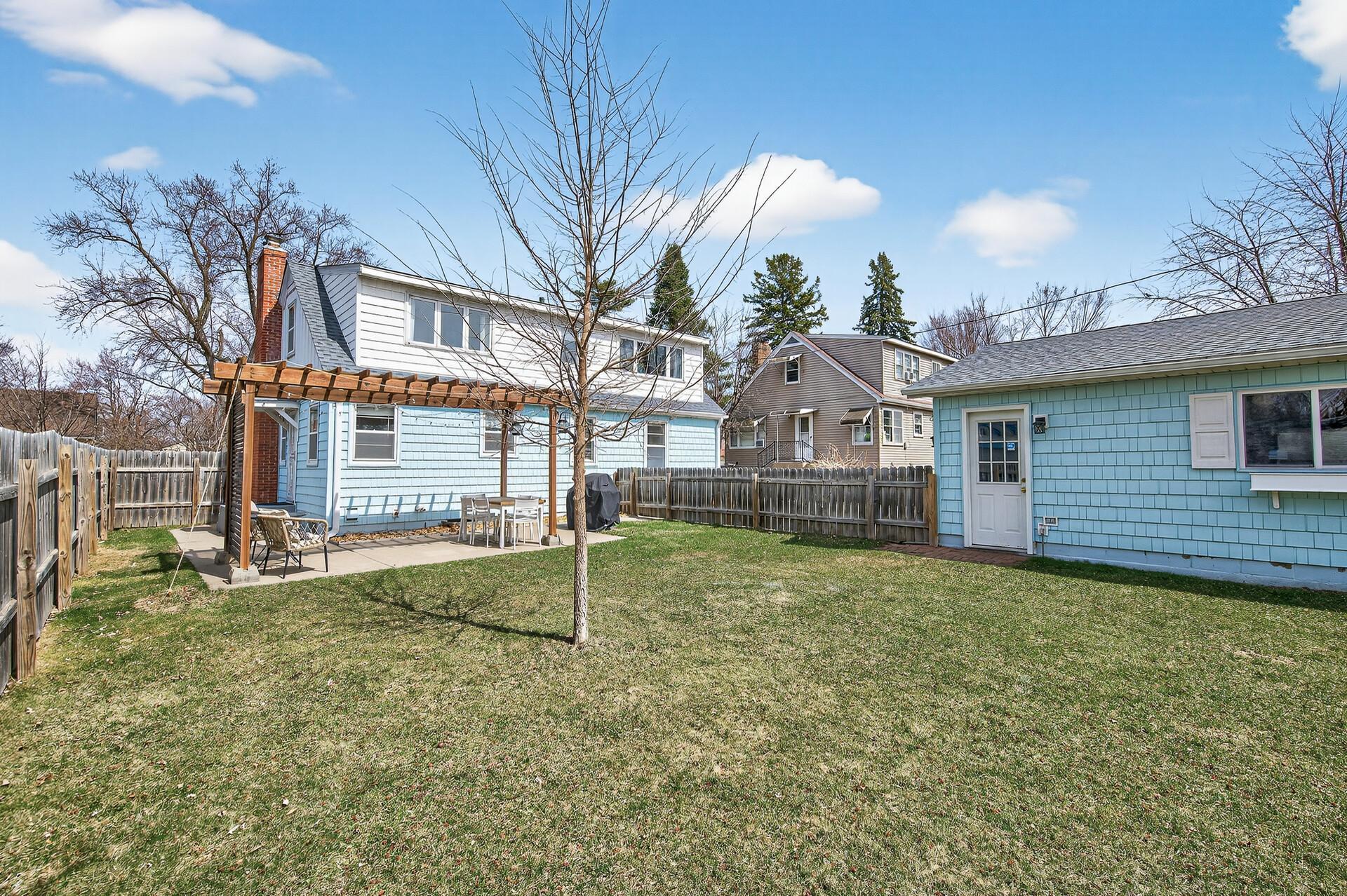 The level backyard is fully fenced and feels very private.