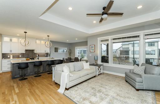 Living room view into kitchen and dining room.jpg