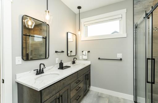 Ensuite bathoom complete with double sinks and window for natural light.jpg