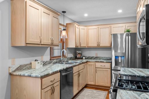 Totally remodeled, new kitchen! Appliances, cabinets, countertops, lighting, and more!!