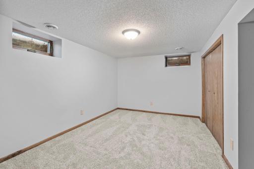 Office / Flex Room in basement (no egress, full closet! Fresh paint, new carpeting!