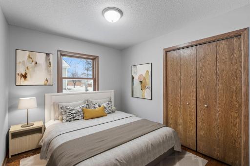 3 bedrooms on the main. Modern colors, gleaming hardwood floors. Double windows in two of the bedrooms. (virtually staged for inspiration)