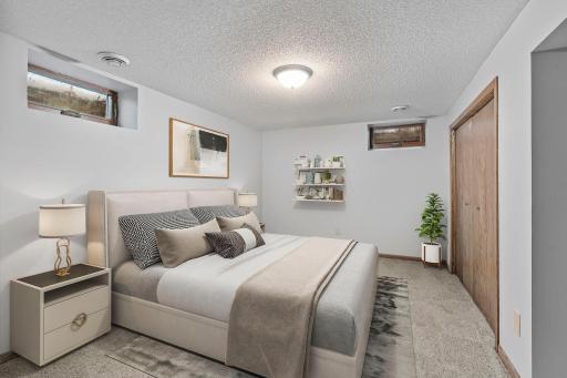 Office / Flex Room in basement. Virtually staged to imagine the possibilities (no egress, closet)