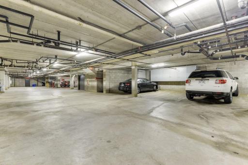 Two heated, underground parking stalls with storage space
