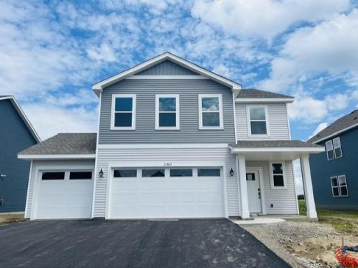 Welcome to 11562 72nd St NE! (Photo is of the actual home in progress.)