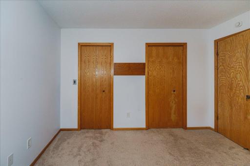 His and hers closets - she gets the walk in