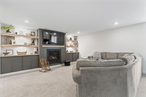 LL Family Room, w/ Recently added Gas Fireplace and Built-ins