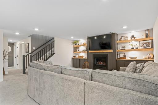 LL Family Room, w/ Recently added Gas Fireplace and Built-ins