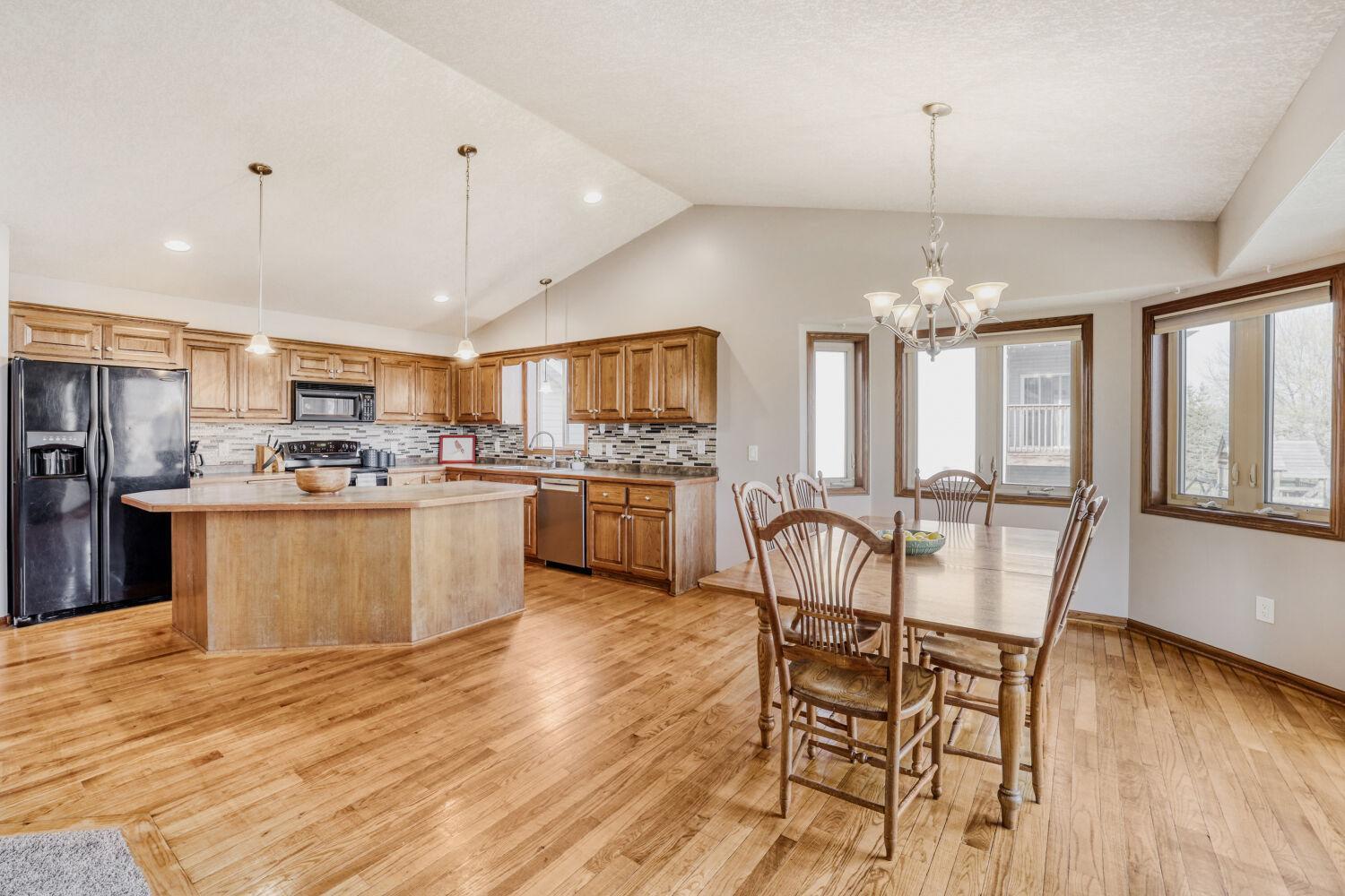 Kitchen Flows Right To Dining Room!