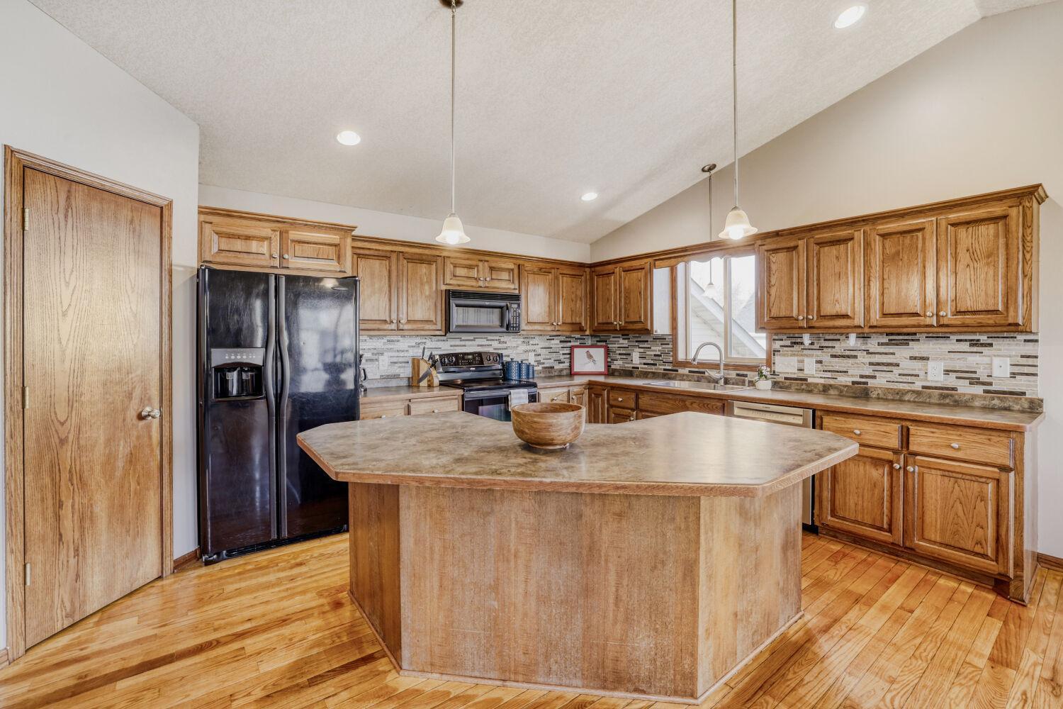 Oversized Island For Easy Meal Prep and Conversation With Guests