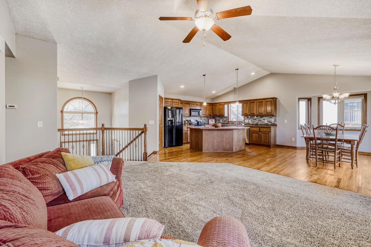 The Open Layout Features A Lovely Kitchen and Large Living and Dining Room