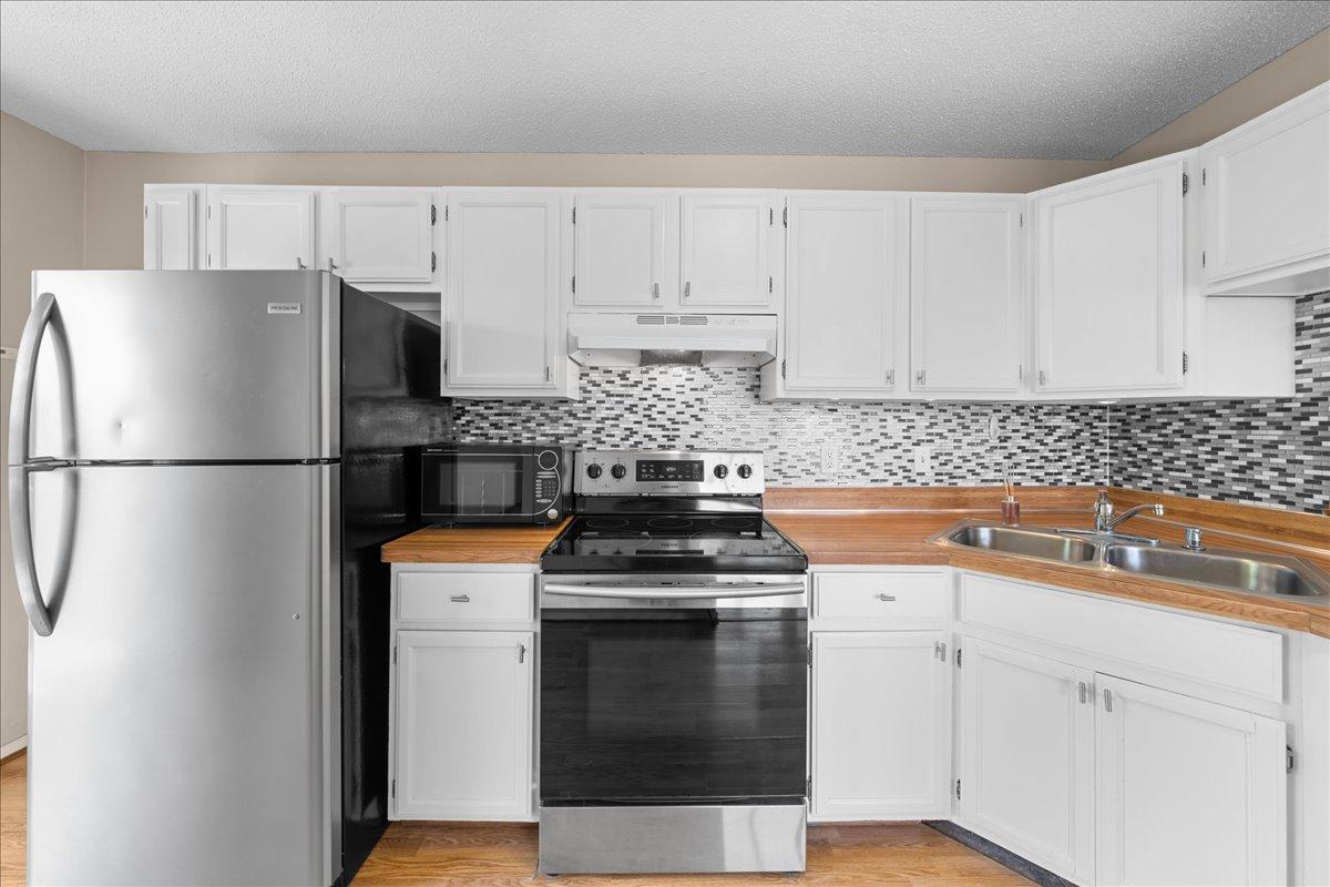 Backsplash adds to the character of this kitchen.