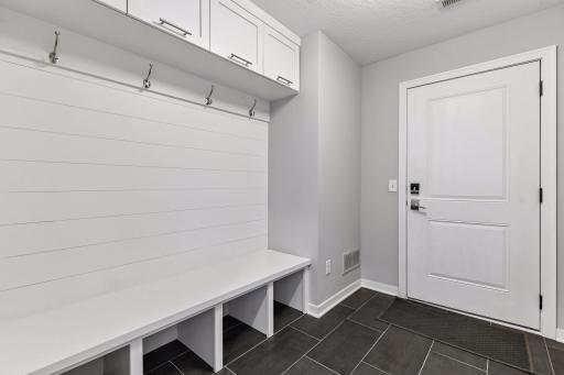 The back entry lockers and storage that walks out to the garage