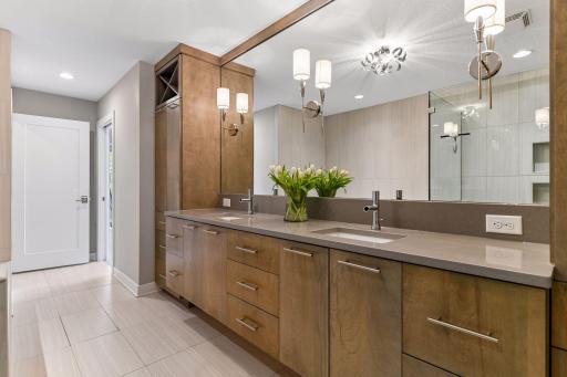 The beautiful 10 ft vanity has dual sinks and quartz countertops