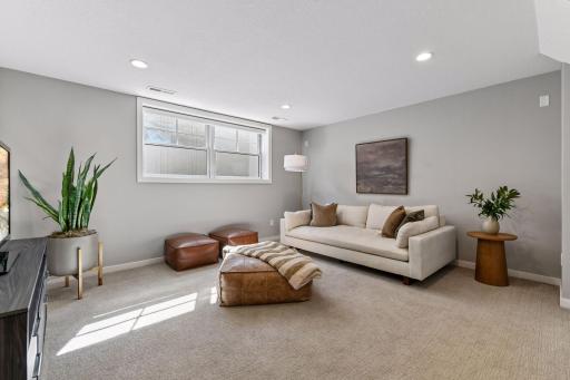 The lower level has plenty of light and a great entertaining space for movies or games