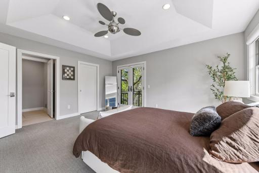The large primary suite open up to a walk-in closet and private bath