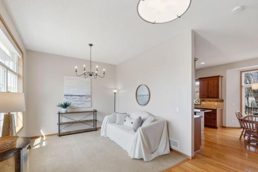 Welcoming front room is perfect for a sitting, conversation space