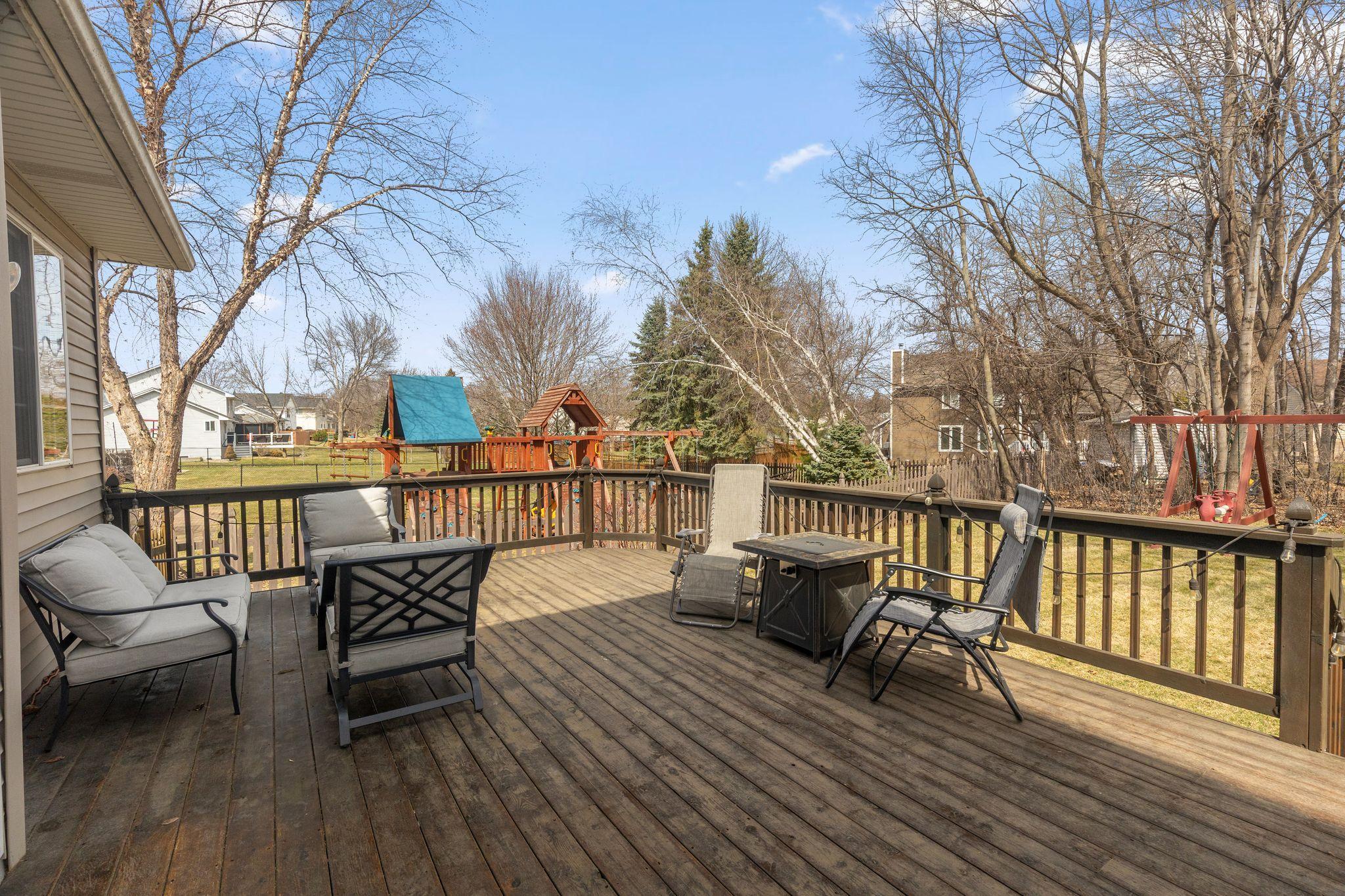 Large deck overlooking backyard