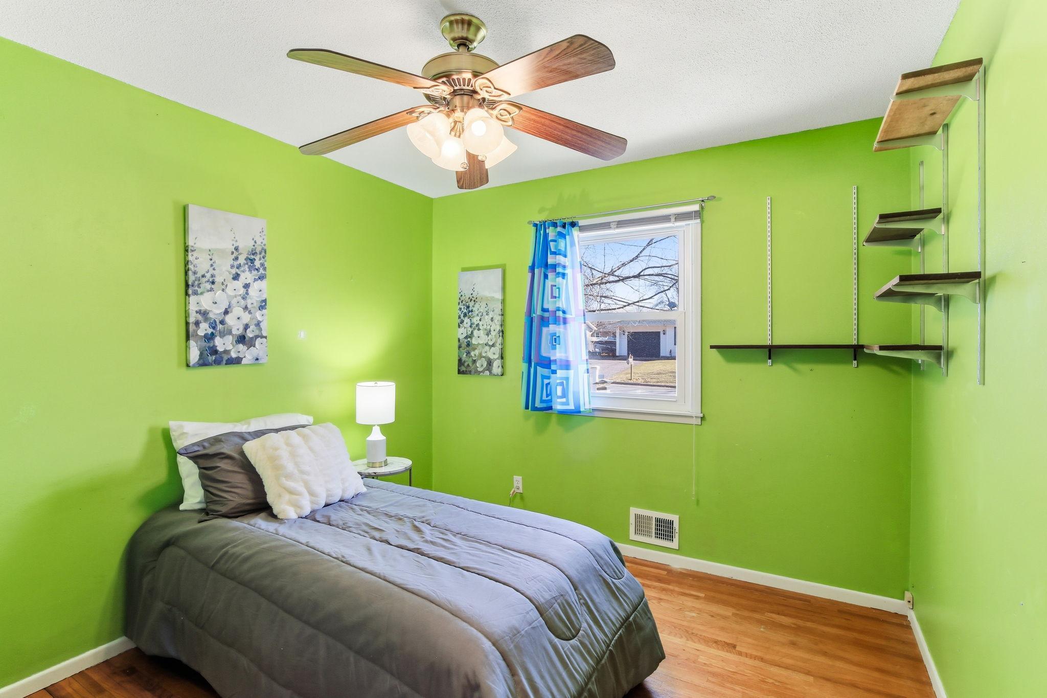 One Bedroom with the Hardwood Floors Showing.